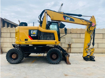 Wheel excavator CAT m317f: picture 2