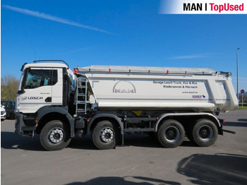 Skip loader truck MAN TGS 41.480 8x4 BB CH Schmitz Muldenkipper: picture 2