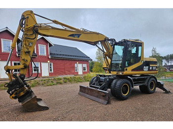 Wheel excavator CATERPILLAR M312