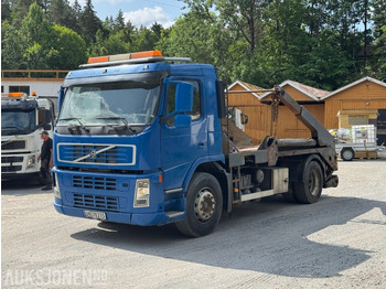 Skip loader truck VOLVO FM9