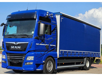 Curtainsider truck MAN TGX