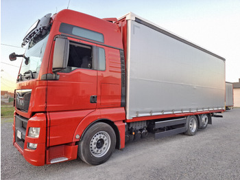 Curtainsider truck MAN TGX 26.440 E6: picture 2