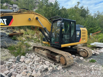 Crawler excavator CATERPILLAR 323
