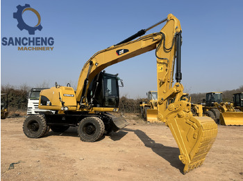 Wheel excavator CATERPILLAR M320