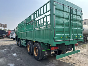 Dropside/ Flatbed truck for transportation of bulk materials SINOTRUK HOWO 420hp 8x4 fence truck: picture 5 Dropside/ Flatbed truck for transportation of bulk materials SINOTRUK HOWO 420hp 8x4 fence truck: picture 5