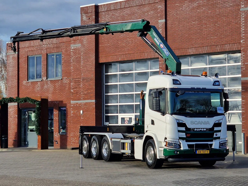 Scania G500 XT 8x4*4 - HMF 2820K Crane - AJK 20T Hooklift - Retarder - Full air - Like new - Crane truck: picture 1 Scania G500 XT 8x4*4 - HMF 2820K Crane - AJK 20T Hooklift - Retarder - Full air - Like new - Crane truck: picture 1