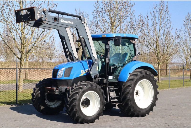 New Holland T6040 | FRONT LOADER | 50KM/H | QUICK COUPLER - Farm tractor: picture 1 New Holland T6040 | FRONT LOADER | 50KM/H | QUICK COUPLER - Farm tractor: picture 1