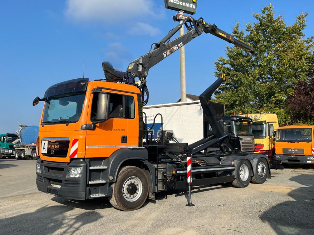 MAN MAN TG-S Abrollkipper mit Kran 26.400 6x4H-2 BL Lift/Lenk - Hook lift truck, Crane truck: picture 1 MAN MAN TG-S Abrollkipper mit Kran 26.400 6x4H-2 BL Lift/Lenk - Hook lift truck, Crane truck: picture 1