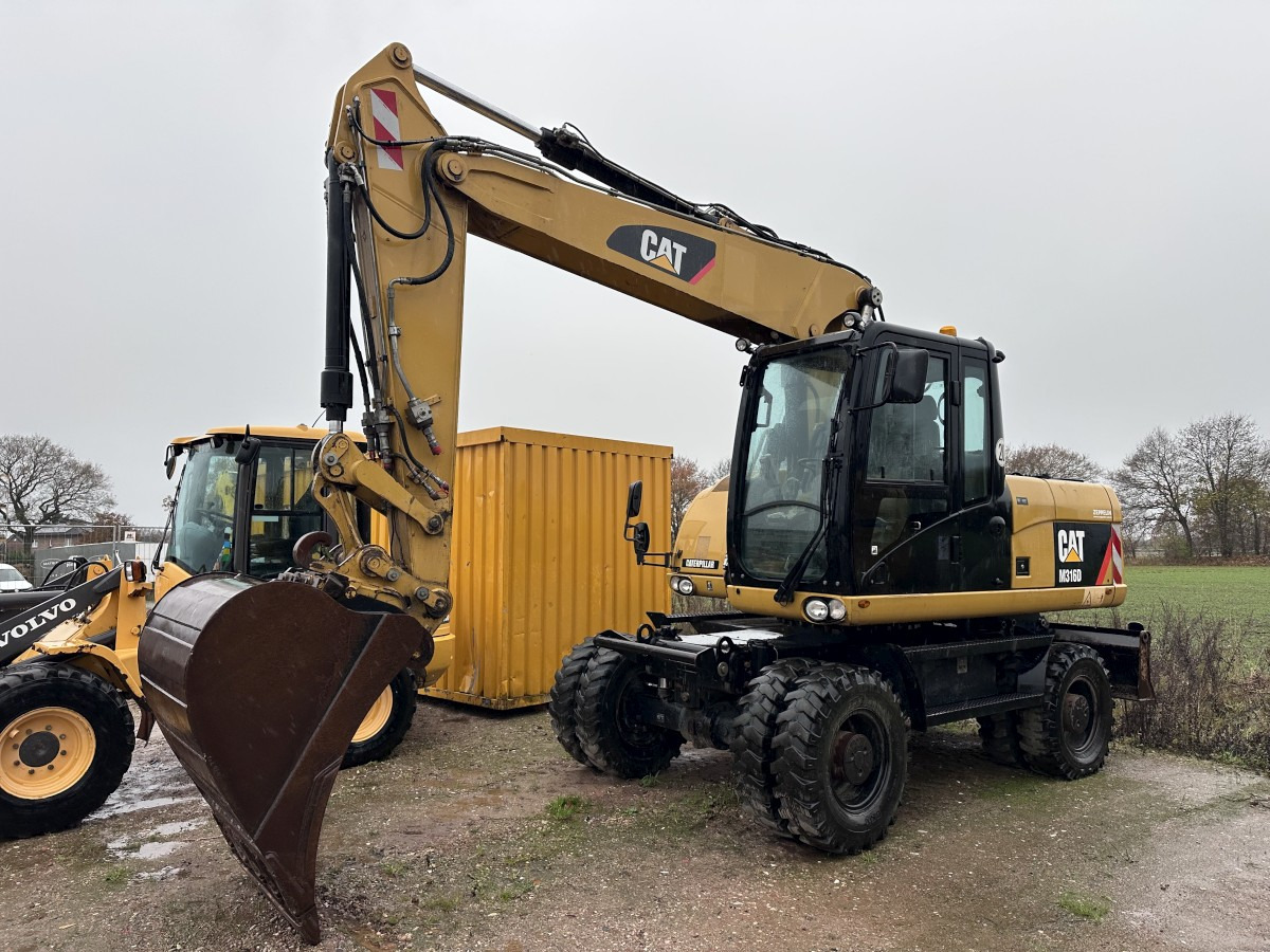 CATERPILLAR M 316 D full Hydr. Top Zustand German machine ! - Wheel excavator: picture 1 CATERPILLAR M 316 D full Hydr. Top Zustand German machine ! - Wheel excavator: picture 1
