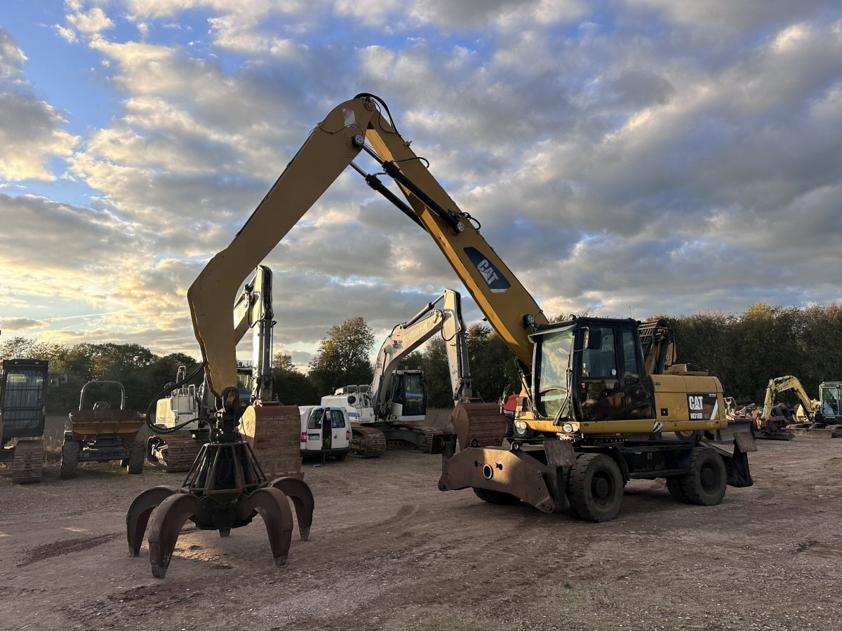 CATERPILLAR M 318 MH mit Greifer Kein 3022 3026 320 322 - Wheel excavator: picture 1 CATERPILLAR M 318 MH mit Greifer Kein 3022 3026 320 322 - Wheel excavator: picture 1