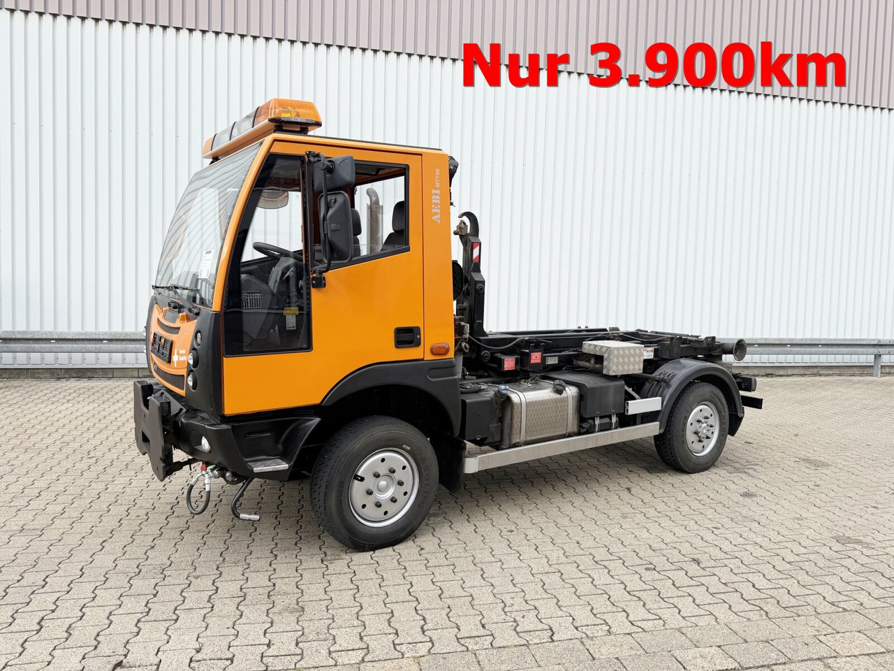 AEBI Schmidt MT750 4x4 AEBI Schmidt MT750 4x4, City-Abroller, Winterdienstausstattung, 2x AHK - Hook lift truck: picture 1 AEBI Schmidt MT750 4x4 AEBI Schmidt MT750 4x4, City-Abroller, Winterdienstausstattung, 2x AHK - Hook lift truck: picture 1