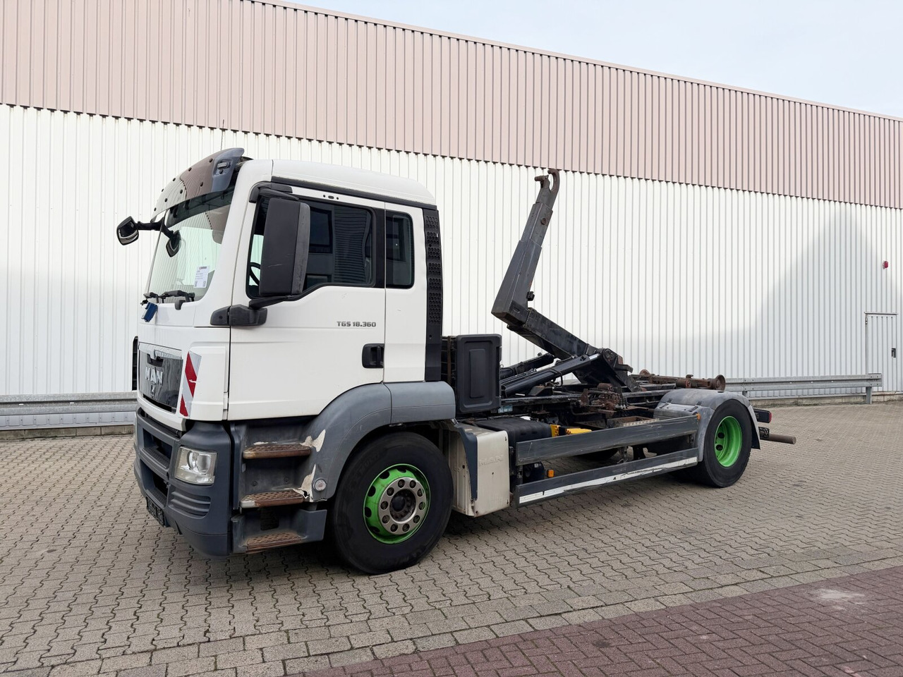 MAN TGS 18.360 4X2 BL TGS 18.360 4X2 BL, Hyva 10.45 S, Teleskopabrollanlage - Hook lift truck: picture 1 MAN TGS 18.360 4X2 BL TGS 18.360 4X2 BL, Hyva 10.45 S, Teleskopabrollanlage - Hook lift truck: picture 1