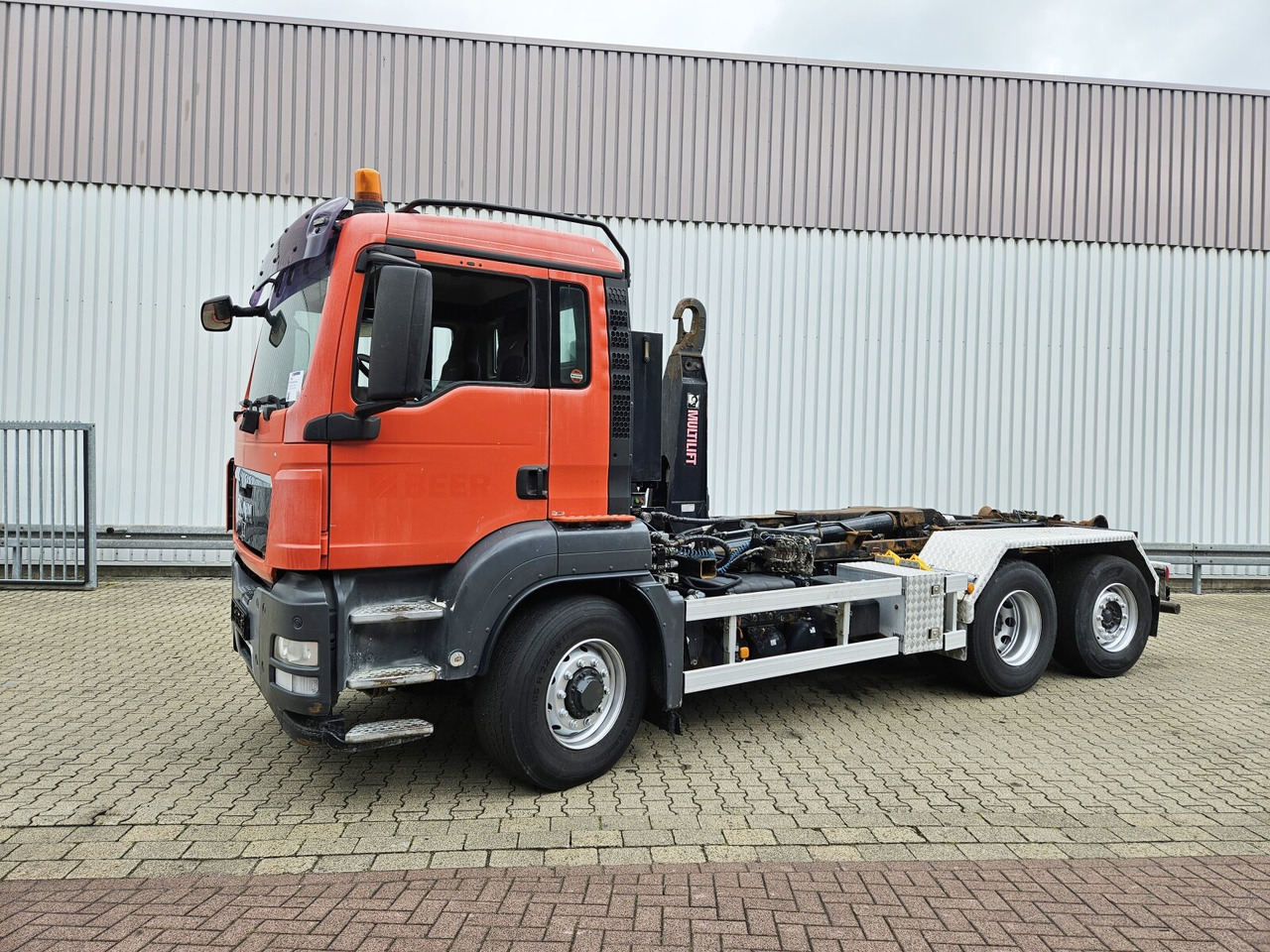MAN TGS 26.480 6x4H-4 BL TGS 26.480 6x4H-4 BL, Multilift Abroller HydroDrive, Lenk-/Liftachse, Wechselfahrzeug - Hook lift truck: picture 1 MAN TGS 26.480 6x4H-4 BL TGS 26.480 6x4H-4 BL, Multilift Abroller HydroDrive, Lenk-/Liftachse, Wechselfahrzeug - Hook lift truck: picture 1