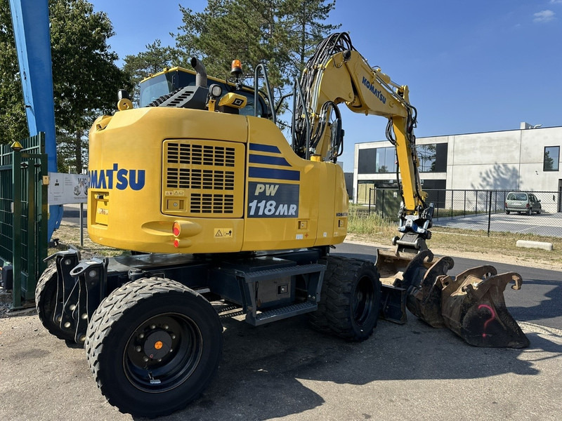 Komatsu PW 118 MR-11 14.3T - SMP ROTOTILT - *2413h* - CENTRAL GREASING - BLADE - 3 BUCKETS - TOP CONDITION - BE MACHINE - Wheel excavator: picture 3 Komatsu PW 118 MR-11 14.3T - SMP ROTOTILT - *2413h* - CENTRAL GREASING - BLADE - 3 BUCKETS - TOP CONDITION - BE MACHINE - Wheel excavator: picture 3