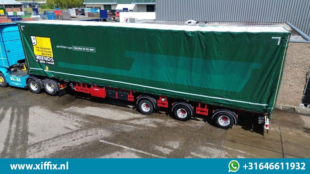 Meusburger TE Huur 3-ass. Vlakke dubbel 2x uitschuifbare oplegger met huifopbouw / 3x gestuurd - Dropside/ Flatbed semi-trailer: picture 4 Meusburger TE Huur 3-ass. Vlakke dubbel 2x uitschuifbare oplegger met huifopbouw / 3x gestuurd - Dropside/ Flatbed semi-trailer: picture 4