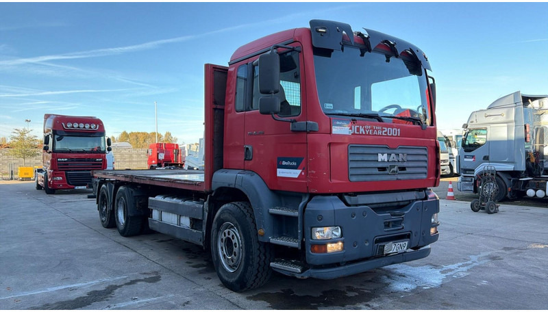 MAN TGA 26.360 (6X4 / STEEL SUSP / LAMES / MANUAL PUMP / BOITE MANUELLE / MANUAL GEARBOX) - Dropside/ Flatbed truck: picture 2 MAN TGA 26.360 (6X4 / STEEL SUSP / LAMES / MANUAL PUMP / BOITE MANUELLE / MANUAL GEARBOX) - Dropside/ Flatbed truck: picture 2