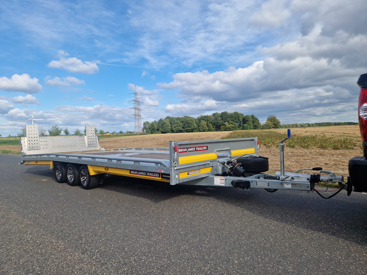 BJT T Transporter 231 550x224cm yellow ankippbar Heckrampe Tridem Alufelgen 10" 3500kg - Autotransporter trailer: picture 3 BJT T Transporter 231 550x224cm yellow ankippbar Heckrampe Tridem Alufelgen 10" 3500kg - Autotransporter trailer: picture 3