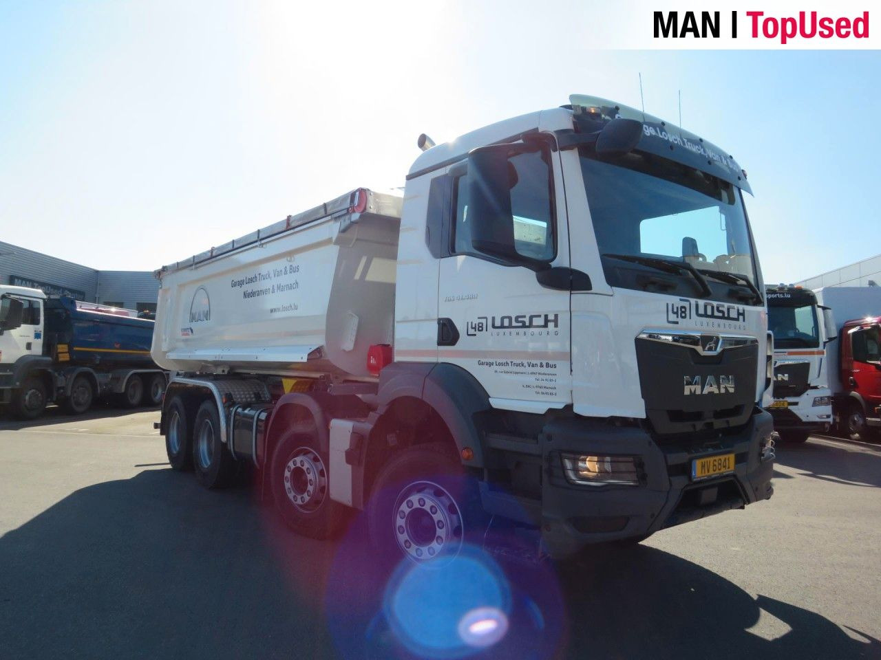 Skip loader truck MAN TGS 41.480 8x4 BB CH Schmitz Muldenkipper: picture 7