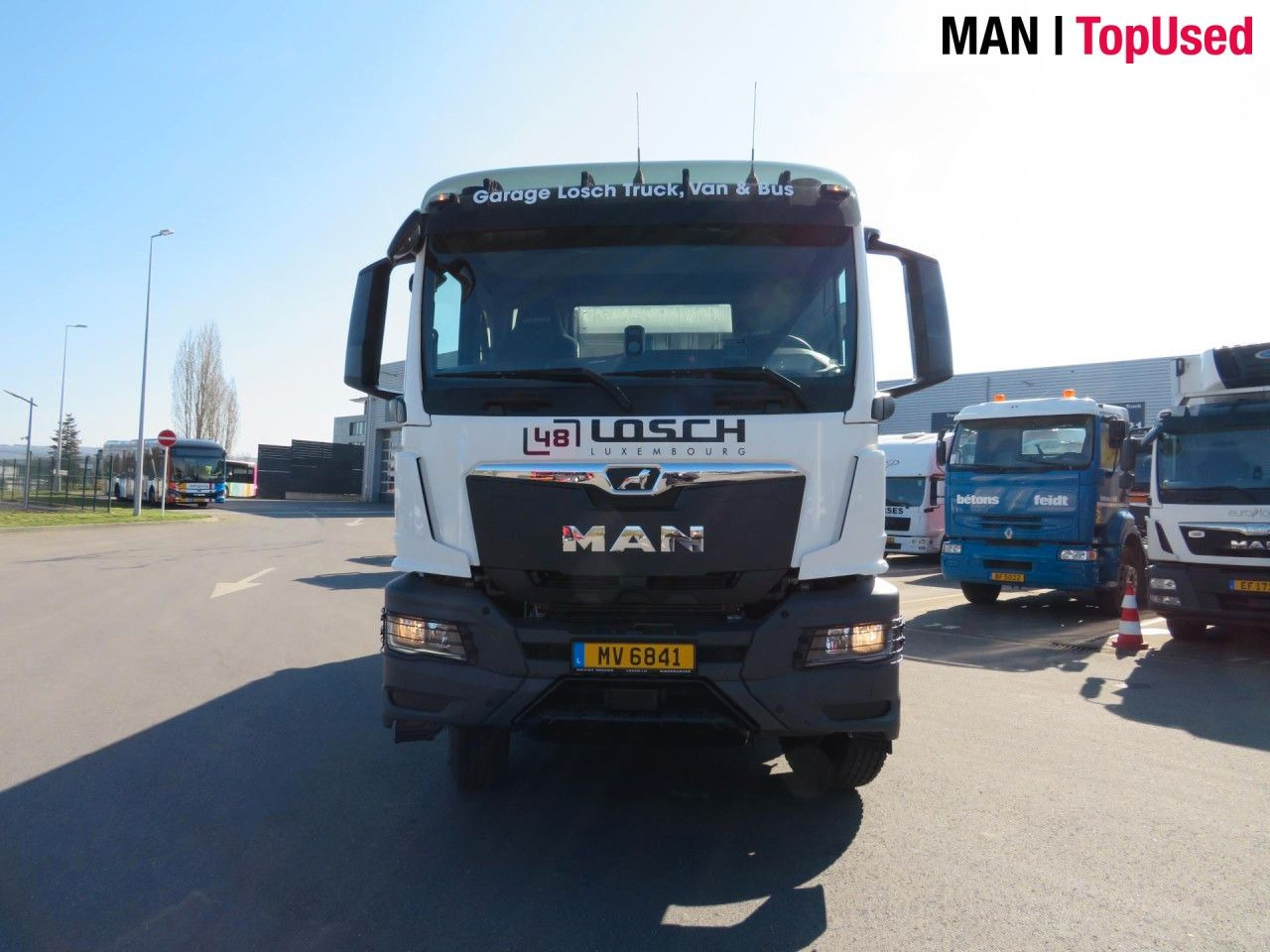 Skip loader truck MAN TGS 41.480 8x4 BB CH Schmitz Muldenkipper: picture 8