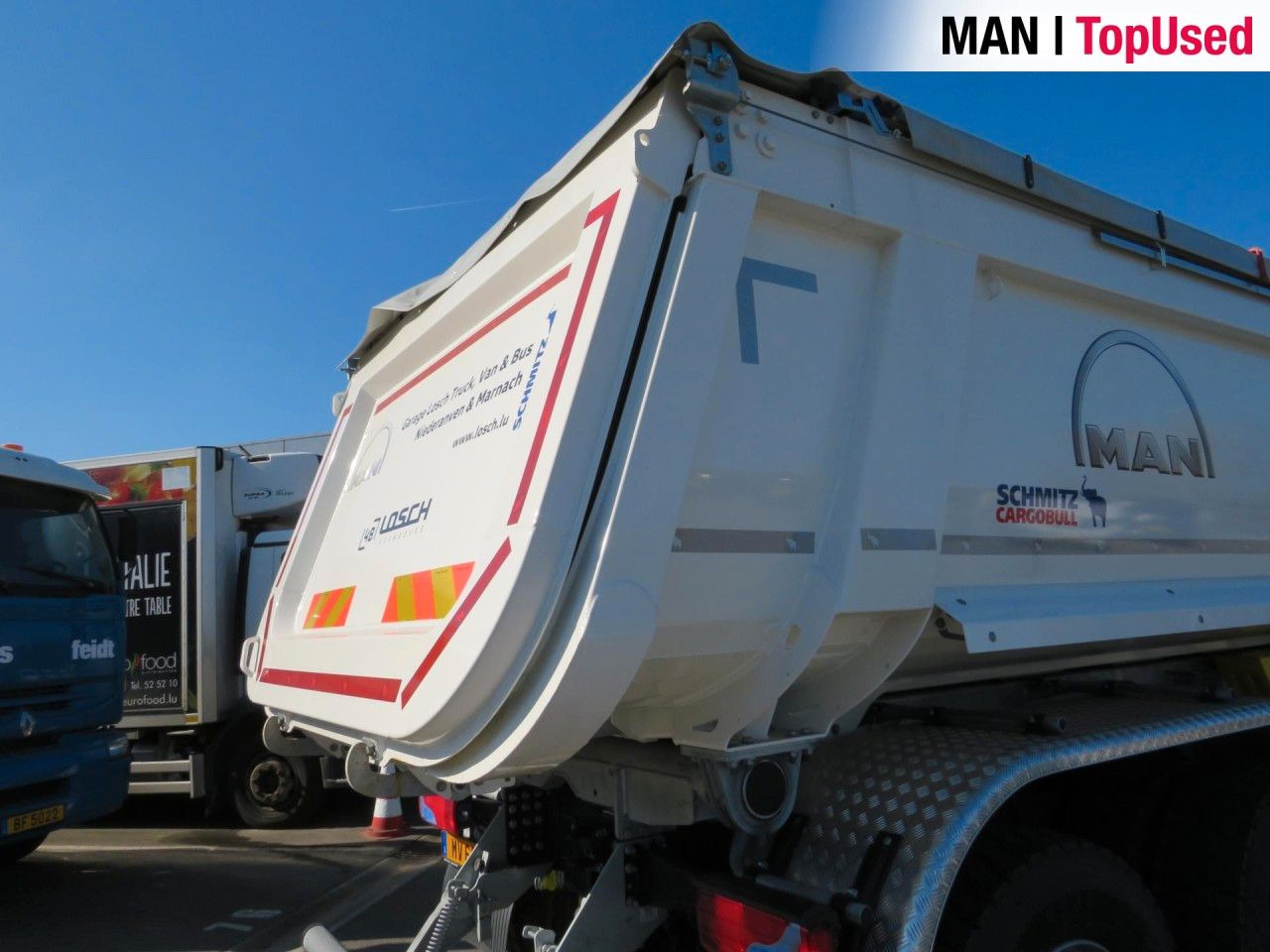 Skip loader truck MAN TGS 41.480 8x4 BB CH Schmitz Muldenkipper: picture 20