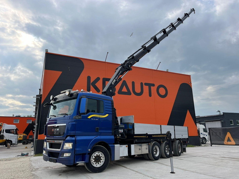 MAN TGX 35.480 8x4*4 HIAB 288E-7 / PLATFORM L=6397 mm - Dropside/ Flatbed truck, Crane truck: picture 1 MAN TGX 35.480 8x4*4 HIAB 288E-7 / PLATFORM L=6397 mm - Dropside/ Flatbed truck, Crane truck: picture 1