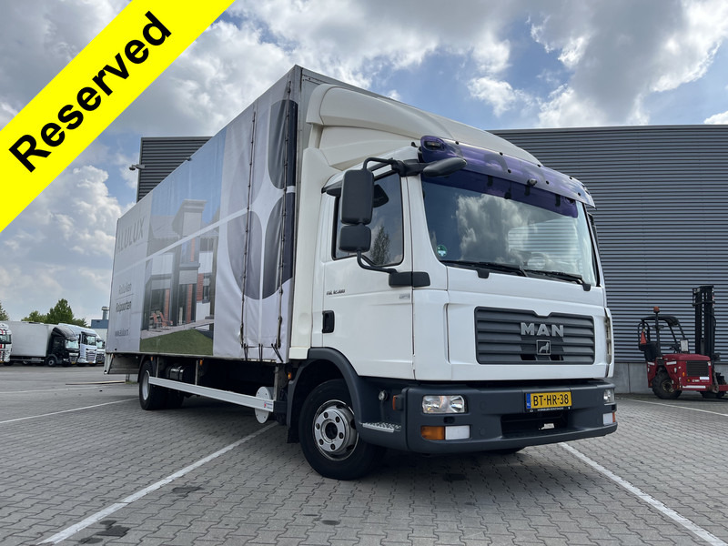 MAN TGL 12.180 Euro 4 / 12 Ton / 781 dkm / Canvas Box / APK TUV 10-25 / Oil Leakage - Box truck: picture 1 MAN TGL 12.180 Euro 4 / 12 Ton / 781 dkm / Canvas Box / APK TUV 10-25 / Oil Leakage - Box truck: picture 1