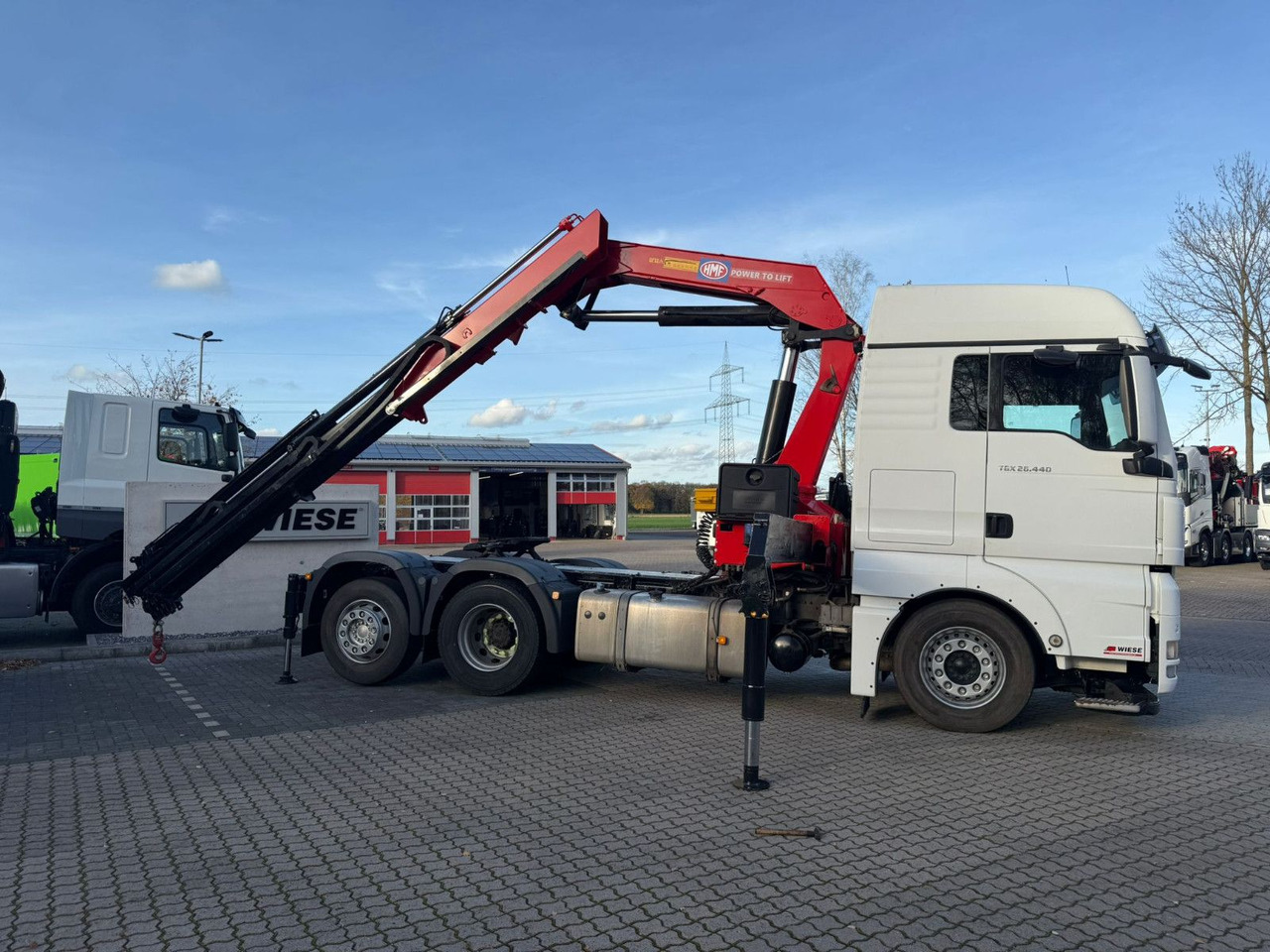 MAN TGX 26.440 6x2 mit HMF 3000-5 Kran Top Zustand - Crane truck: picture 1 MAN TGX 26.440 6x2 mit HMF 3000-5 Kran Top Zustand - Crane truck: picture 1