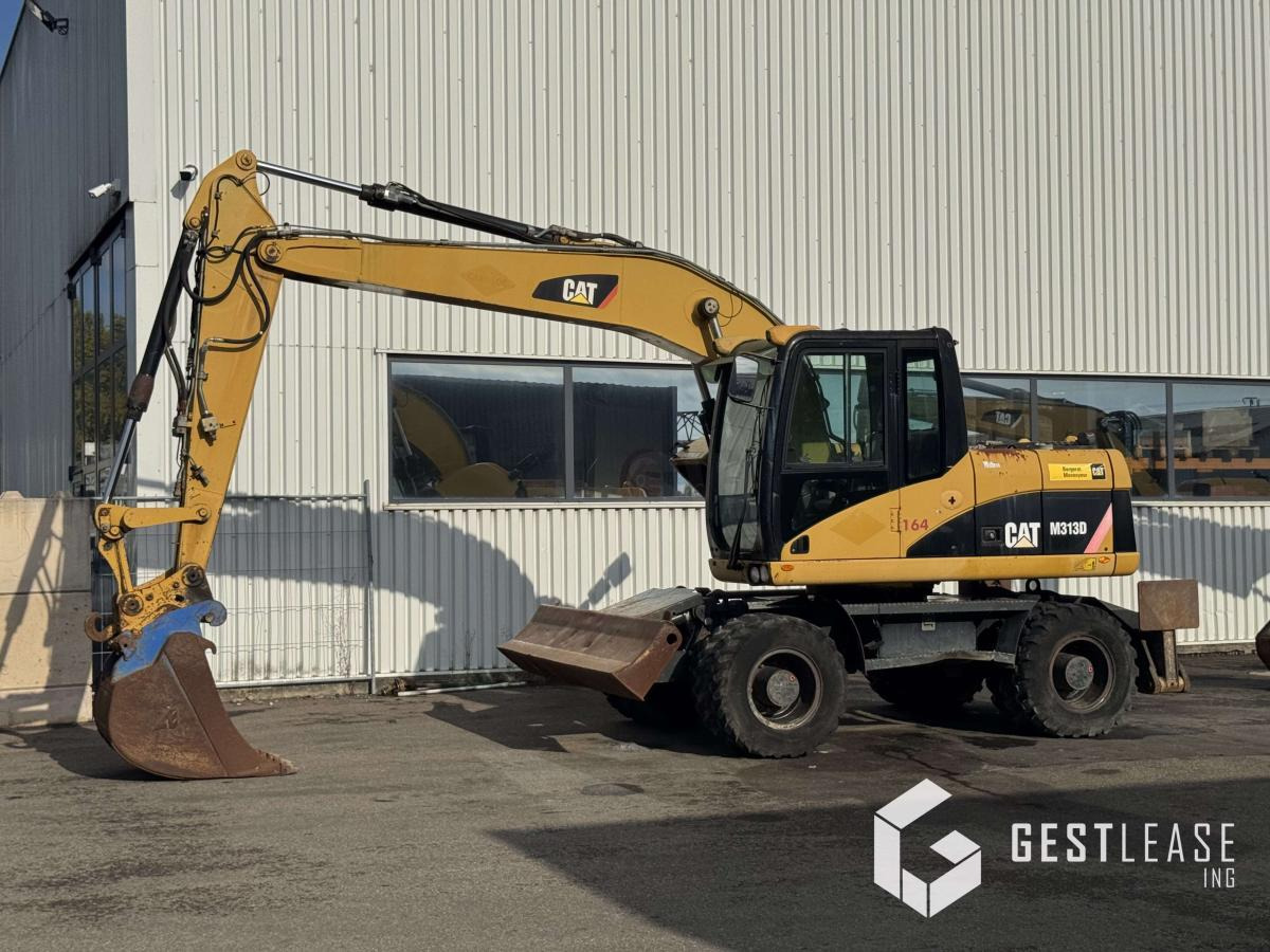 Caterpillar M313D - Wheel excavator: picture 1 Caterpillar M313D - Wheel excavator: picture 1