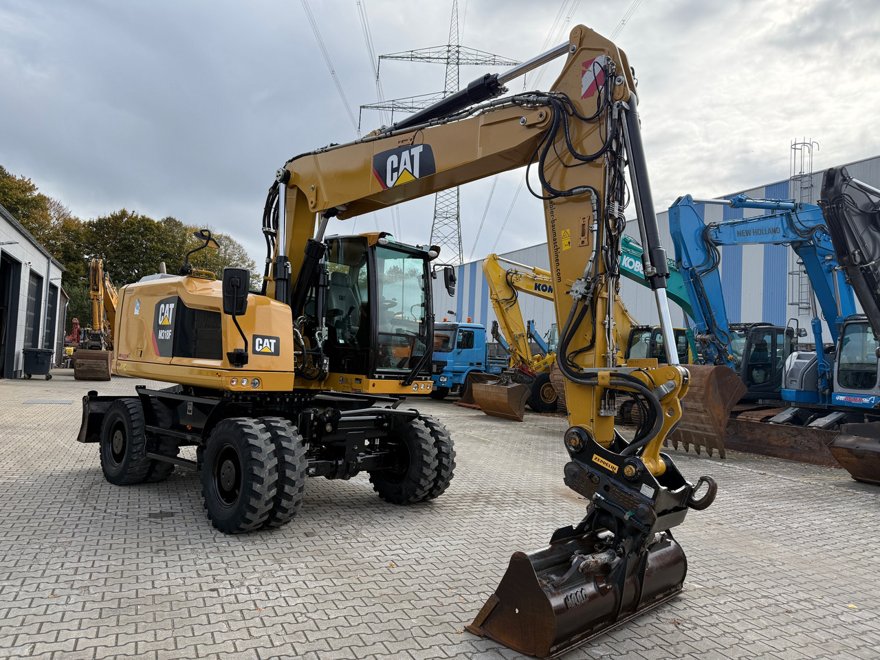 CAT M318F Mobilbagger OQ65 SW - Excavator: picture 3 CAT M318F Mobilbagger OQ65 SW - Excavator: picture 3