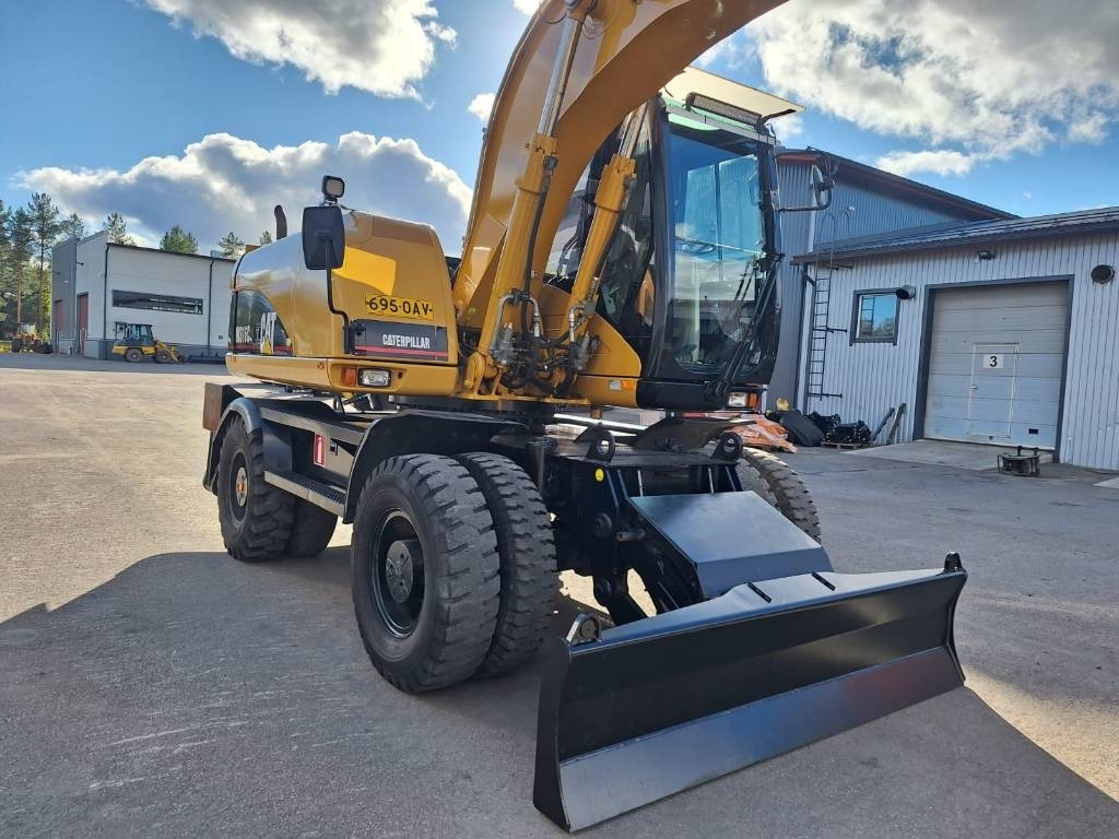 Wheel excavator CAT M316C: picture 6