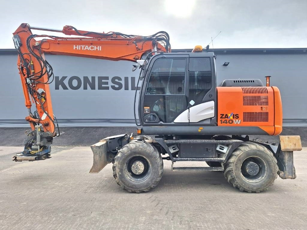 Hitachi ZX140W-5 HUIPPUVARUSTEET - Wheel excavator: picture 1 Hitachi ZX140W-5 HUIPPUVARUSTEET - Wheel excavator: picture 1
