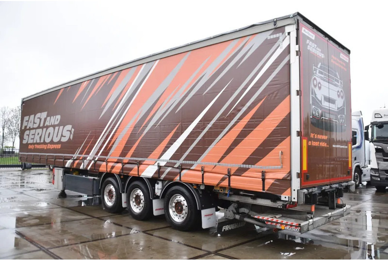 Fruehauf SLIDING CURTAINS/ROOF - TOPLIFT SYSTEM - LIFT AXLE - STEERING AXLE - SAF AXLES - ALCOA'S - DHOLLANDIA - TOP CONDITION - - Curtainsider semi-trailer: picture 4 Fruehauf SLIDING CURTAINS/ROOF - TOPLIFT SYSTEM - LIFT AXLE - STEERING AXLE - SAF AXLES - ALCOA'S - DHOLLANDIA - TOP CONDITION - - Curtainsider semi-trailer: picture 4