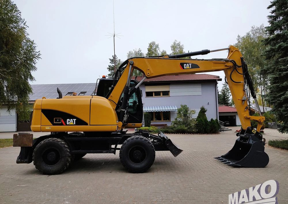 Caterpillar M313D - Wheel excavator: picture 5 Caterpillar M313D - Wheel excavator: picture 5