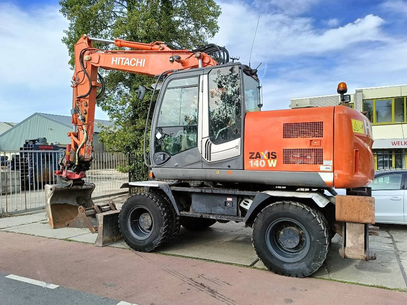 Hitachi ZX 140 W-3 mobiele graafmachine mobile excavator - Wheel excavator: picture 1 Hitachi ZX 140 W-3 mobiele graafmachine mobile excavator - Wheel excavator: picture 1