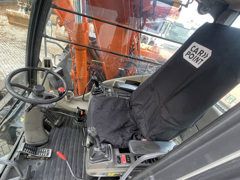 Wheel excavator Hitachi ZX 140 W-3: picture 12