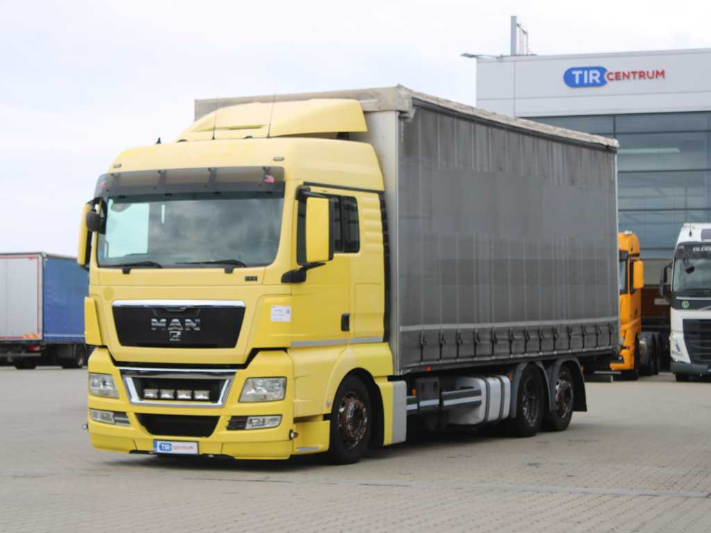 MAN TGX 24.440, EURO 5EEV, 6X2, AIR SUSPENSION - Curtainsider truck: picture 1 MAN TGX 24.440, EURO 5EEV, 6X2, AIR SUSPENSION - Curtainsider truck: picture 1