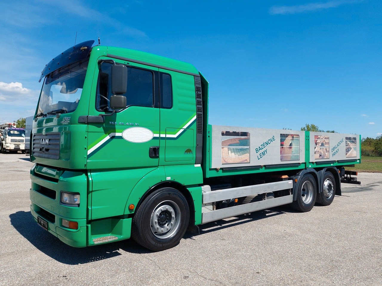 MAN TGA 26.430 LL 6x2-2 - Dropside/ Flatbed truck: picture 1 MAN TGA 26.430 LL 6x2-2 - Dropside/ Flatbed truck: picture 1