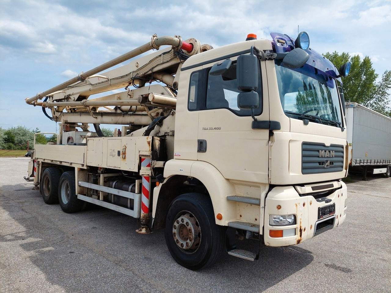 MAN TGA 33.400 6x4 BB JMBH 33 - Concrete pump truck: picture 2 MAN TGA 33.400 6x4 BB JMBH 33 - Concrete pump truck: picture 2