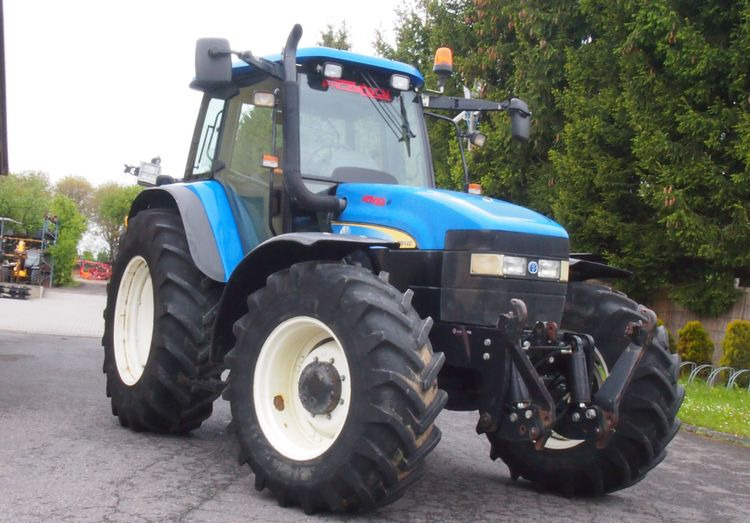 Ciągnik New Holland TM 140 2004 Przedni TUZ - Farm tractor: picture 2 Ciągnik New Holland TM 140 2004 Przedni TUZ - Farm tractor: picture 2