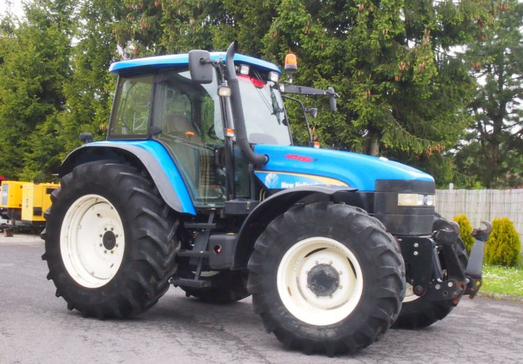 Ciągnik New Holland TM 140 2004 Przedni TUZ - Farm tractor: picture 1 Ciągnik New Holland TM 140 2004 Przedni TUZ - Farm tractor: picture 1