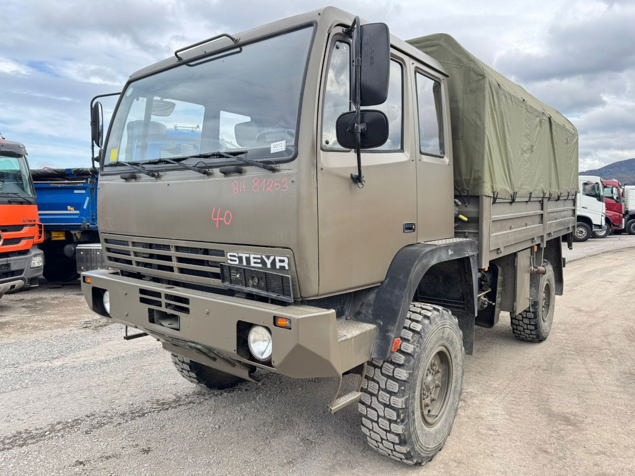 Steyr 12M18 4X4 stake body - truck - Curtainsider truck: picture 1 Steyr 12M18 4X4 stake body - truck - Curtainsider truck: picture 1