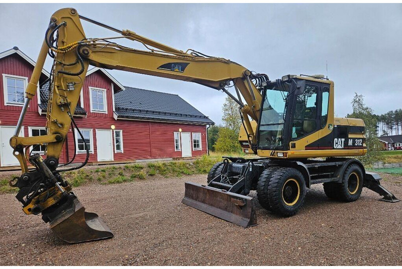 Caterpillar M312 Engcon EC20 tiltrotator - Wheel excavator: picture 1 Caterpillar M312 Engcon EC20 tiltrotator - Wheel excavator: picture 1