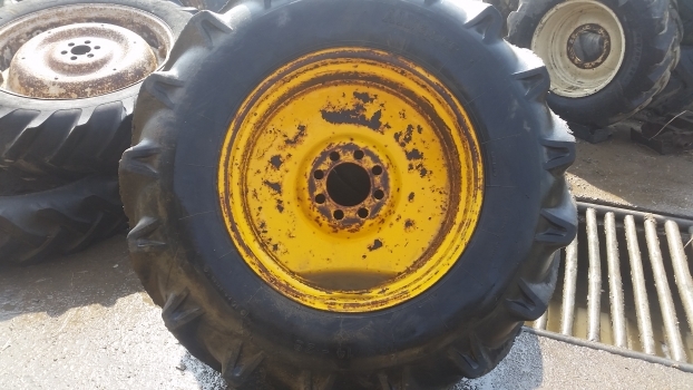 Ford Construction Wheel And Tyre 16.9/14-28. Please Check Decription. - Wheel and tire package for Farm tractor: picture 1 Ford Construction Wheel And Tyre 16.9/14-28. Please Check Decription. - Wheel and tire package for Farm tractor: picture 1