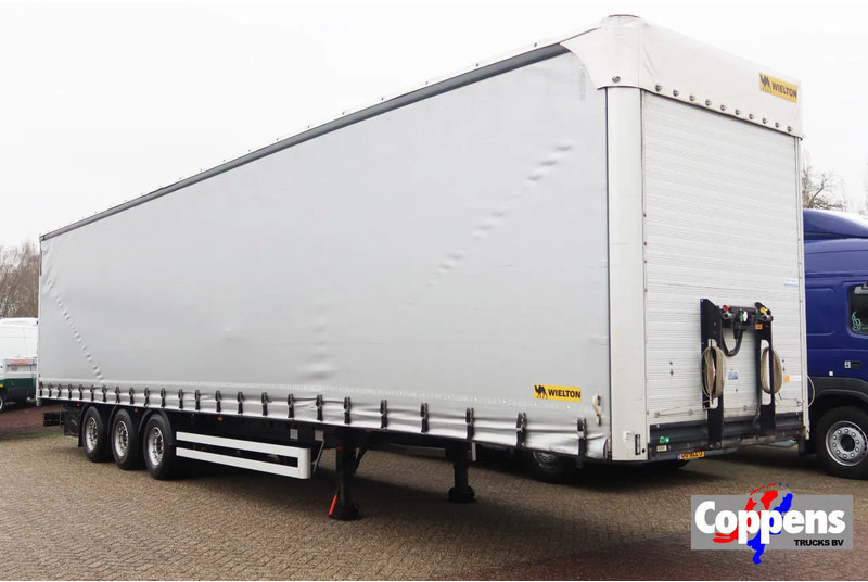 Wielton Mega Trailer with Terberg King Lifter contruction. Kooiaap aansluiting € 17.950.- netto. - Curtainsider semi-trailer: picture 1 Wielton Mega Trailer with Terberg King Lifter contruction. Kooiaap aansluiting € 17.950.- netto. - Curtainsider semi-trailer: picture 1