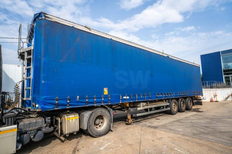 Schmitz SCS27 + TAUT VRAC - Curtainsider semi-trailer: picture 1 Schmitz SCS27 + TAUT VRAC - Curtainsider semi-trailer: picture 1