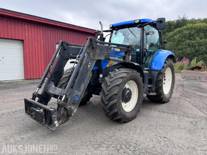 2012 New Holland T6050 med Trima +4.1P frontlaster og panser beskytter - 40 km/t - Farm tractor: picture 1 2012 New Holland T6050 med Trima +4.1P frontlaster og panser beskytter - 40 km/t - Farm tractor: picture 1