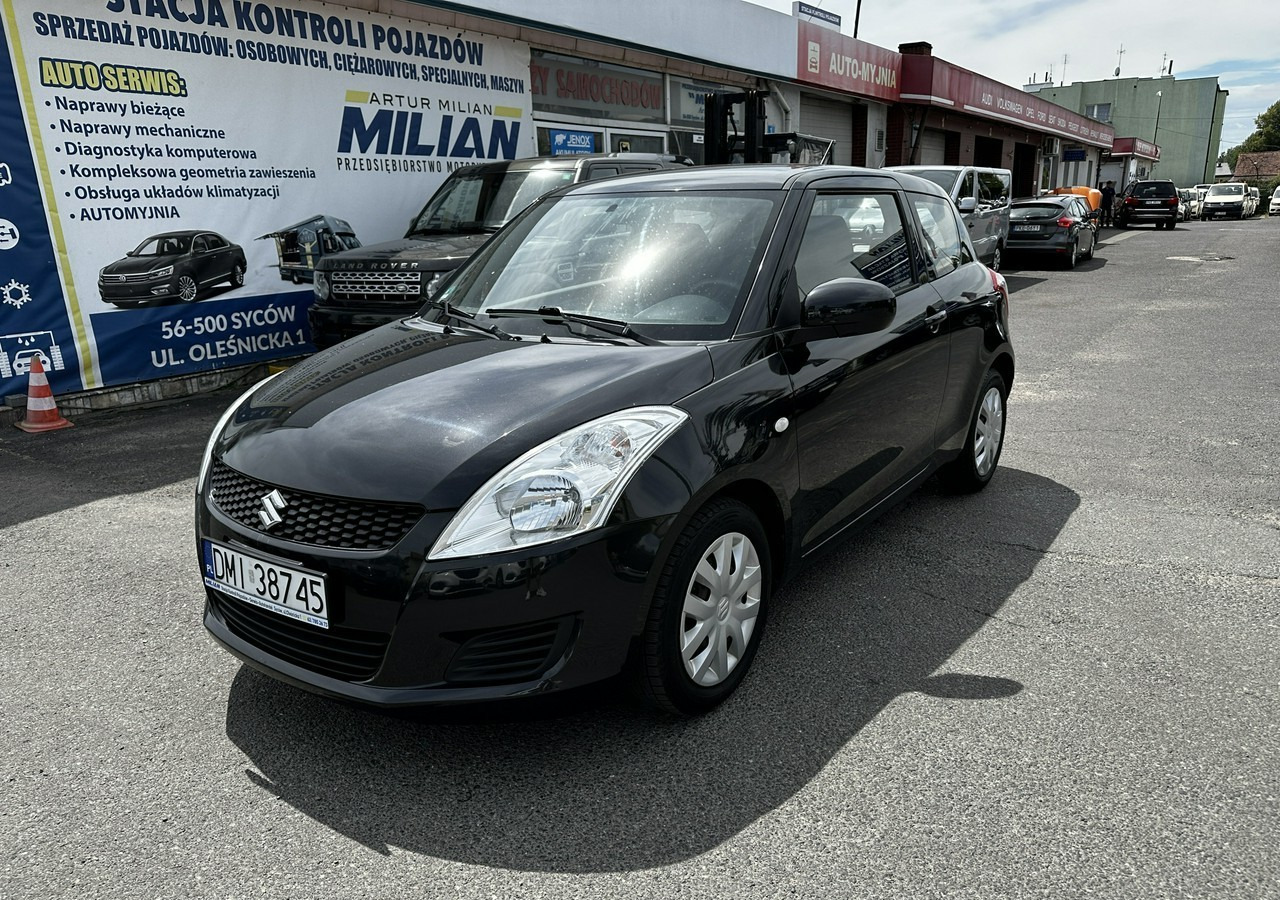 Suzuki Swift V Suzuki Swift 1.2-94KM Klima Model 2012 - Hatchback: picture 2 Suzuki Swift V Suzuki Swift 1.2-94KM Klima Model 2012 - Hatchback: picture 2