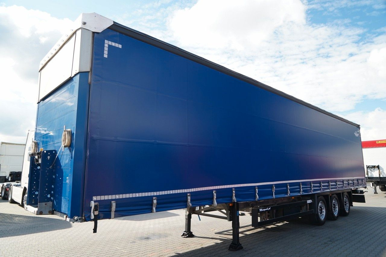 Schmitz Cargobull FIRANKA VARIOS / PODNOSZONY DACH / OPONY 385/55 - Curtainsider semi-trailer: picture 4 Schmitz Cargobull FIRANKA VARIOS / PODNOSZONY DACH / OPONY 385/55 - Curtainsider semi-trailer: picture 4