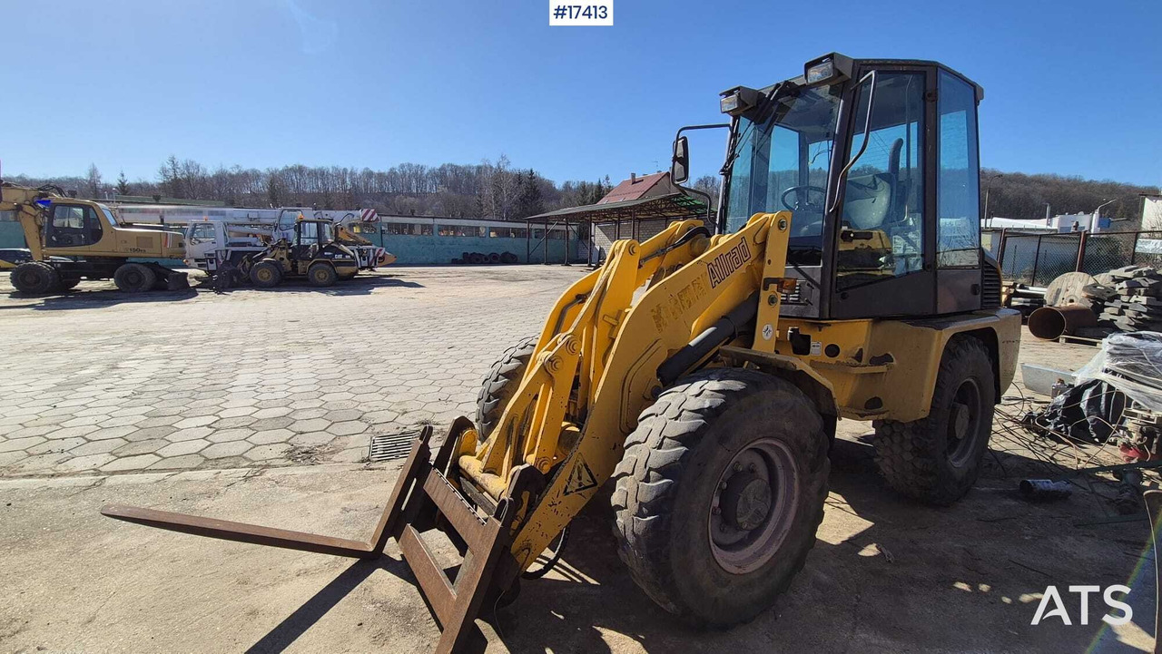 Wheel loader AHLMANN AL 85t 2004) forks, quick coupler, opening bucket. - Wheel loader: picture 1 Wheel loader AHLMANN AL 85t 2004) forks, quick coupler, opening bucket. - Wheel loader: picture 1
