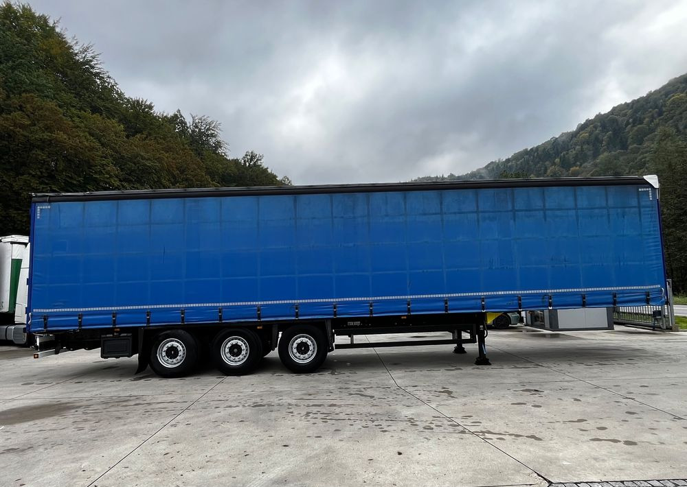 Schmitz Cargobull Firanka Standard Coilmulde // 9m // Oś podnoszona // Osie Schmitz // - Curtainsider semi-trailer: picture 4 Schmitz Cargobull Firanka Standard Coilmulde // 9m // Oś podnoszona // Osie Schmitz // - Curtainsider semi-trailer: picture 4